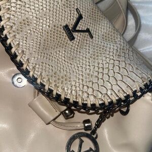 Elegant Cream Designer Handbag